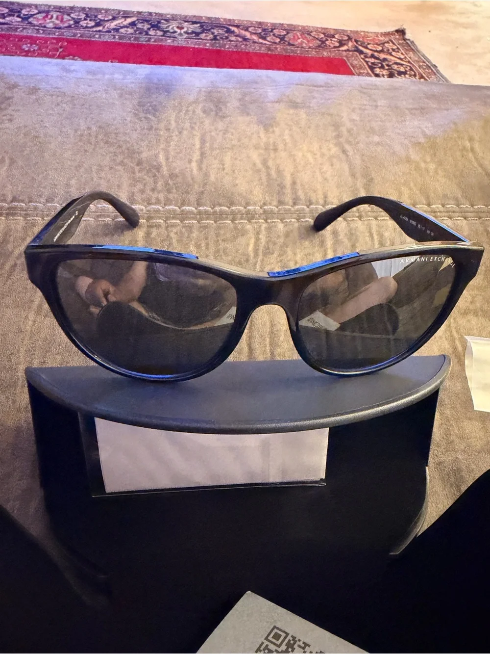 Armani Exchange Black Cat-Eye Sunglasses with Red Logo Accent